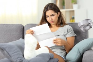 woman reading letter after personal injury accident
