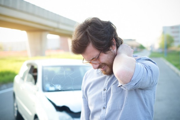 man-feeling-pain-to-the-neck-after-car-crash-picture